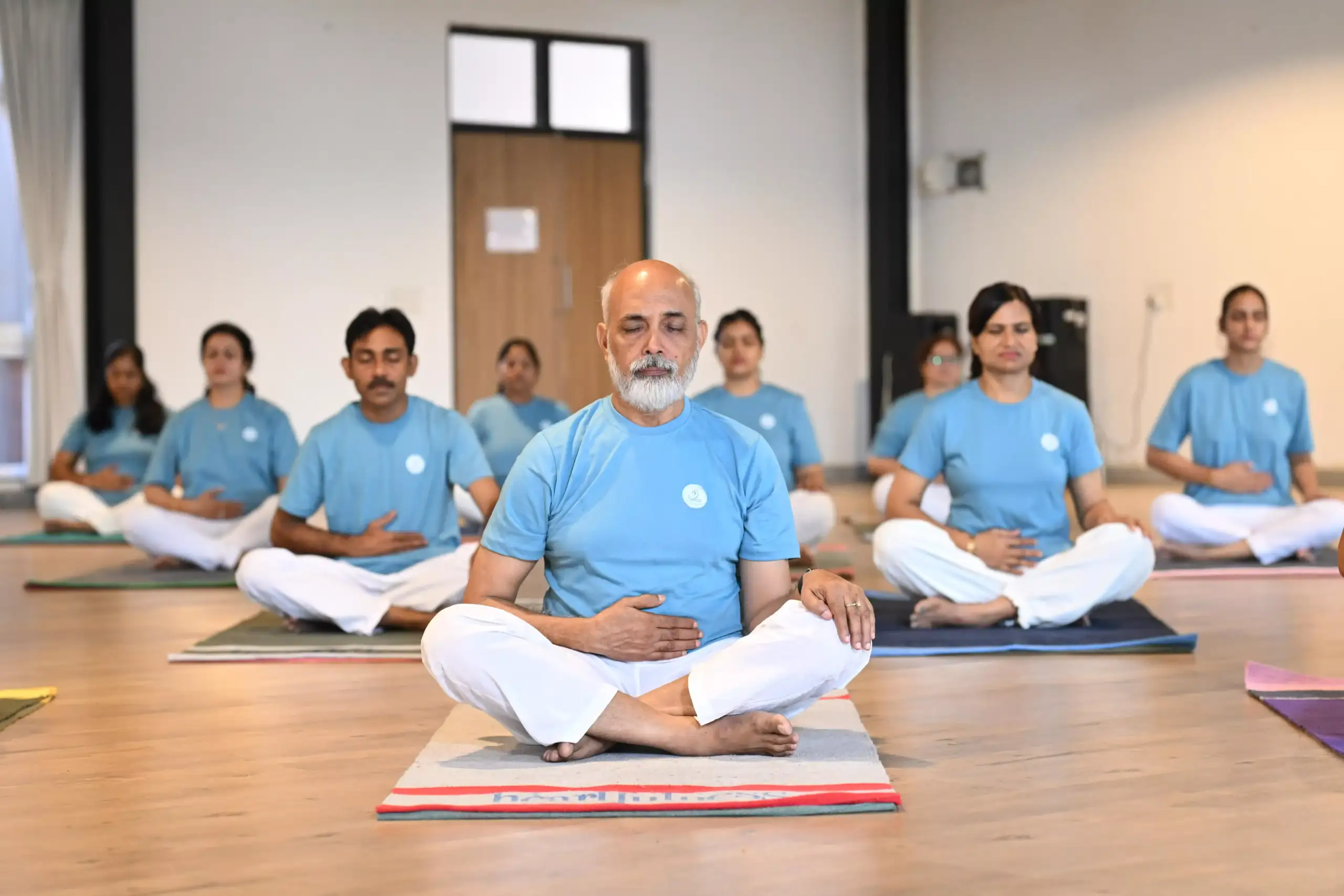 Yoga Protocol Instructor trainees practising meditation at Heartfulness Yoga Academy